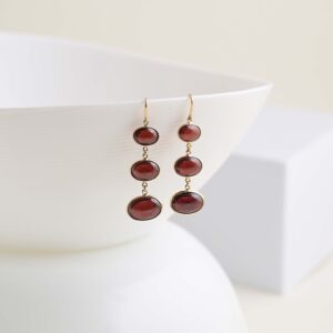 earring with garnet ovel
